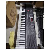 AQNIEGEP 61 Key Electric Keyboard Piano for Beginners w/Light-Up Keys, Christmas Gifts, Full Set: Stand, Bench, Headphones, Padded Bag, Note Stickers, 70 Demos, 200 Rhythms/Tones, LED Display