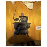 MINI ANTIQUE CAST IRON SAMPLE STOVE..................DR
