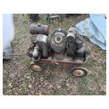 VINTAGE RED WAGON WITH 3 VINTAGE GAS MOTORS..............................BY