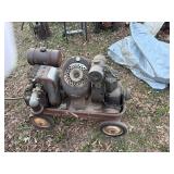 VINTAGE RED WAGON WITH 3 VINTAGE GAS MOTORS..............................BY