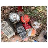 Pile of metal gas cans -- BY
