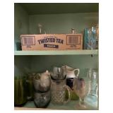 MISC CABINET OF  DISHES, GLASSES, SAUCERS.............KTCN