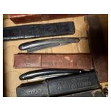 14 STRAIGHT EDGE RAZORS/ AND RAZOR STRAP..............DR