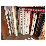 Wood shelf full of cookbooks -- DR