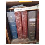 Wooden Bookshelf With MIsc Law & Health Books.