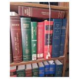Wooden Bookshelf With MIsc Law & Health Books.