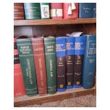 Wooden Bookshelf With MIsc Law & Health Books.
