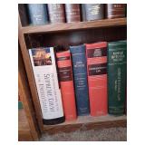 Wooden Bookshelf With MIsc Law & Health Books.