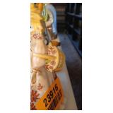 Vintage Lefton porcelain figurine of a woman in a large dress with red flowers