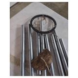 Large Metal Wind Chimes with Wooden Striker has one chime loose