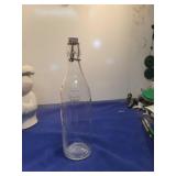 Clear Glass Swing Top Bottle with Embossed Logo