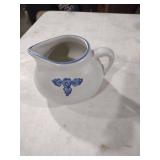 White Porcelain Creamer with Blue Floral Design
