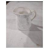 White Porcelain Creamer with Embossed Design