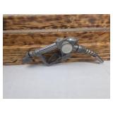 Wood shelve with Gas Pump Nozzle