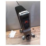 1500-Watt Black Indoor Electric Oil-Filled Radiator Convection Radiant Space Heater with Remote Control for Living Space (Missing one Wheel) - Retail: $65