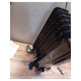 1500-Watt Black Indoor Electric Oil-Filled Radiator Convection Radiant Space Heater with Remote Control for Living Space (Missing one Wheel) - Retail: $65