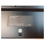 Wireless Keyboard and Mouse Combo Full Size Slim Thin Wireless Keyboard Mouse with On/Off Switch on Both Keyboard and Mouse - (Black and Silver) Mouse is Missing USB Dongle.  KEYBOARD has a USB Dongle