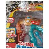 Heroes of Goo Jit Zu Goo-Tron Supreme Combines The Power of Blazagon, Pantaro & Thrash in 1 Ultimate Hero, with 3 Different Goo Fillings, 35+ Phrases & Lights, Face Swap & Triple Attack Feature - Reta