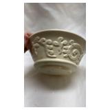 White Ceramic Bowl with Raised Rose Pattern White Ceramic Bowl with Raised Rose Pattern