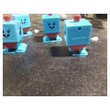 The Dreidel Company 4 Pack Hanukkah Wind-Up and Watch Him Walk-Jump Dreidel, Chanukah Party Favors, Novelty Toys for Boys and Girls