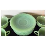 Fire King Jadeite set of 13 cups and saucers.