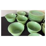 Fire King Jadeite set of 13 cups and saucers.