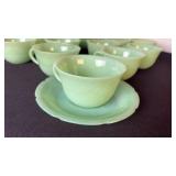 Fire King Jadeite set of 13 cups and saucers.