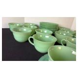 Fire King Jadeite set of 13 cups and saucers.