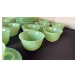 Fire King Jadeite set of 13 cups and saucers.