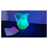 Fenton UV reactive painted pitcher with a Burmese treatment