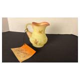 Fenton UV reactive painted pitcher with a Burmese treatment