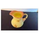 Fenton UV reactive painted pitcher with a Burmese treatment