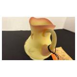 Fenton UV reactive painted pitcher with a Burmese treatment