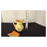 Fenton UV reactive painted pitcher with a Burmese treatment