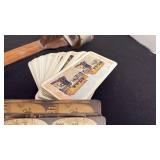 Antique hand-held wooden stereoscope viewer with picture cards