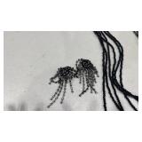 Womens necklace and pair of earrings