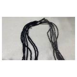 Womens necklace and pair of earrings