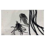 Womens necklace and pair of earrings