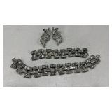 Womens bracelets and pair of earrings