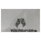 Womens bracelets and pair of earrings