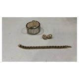 Womens bracelets and pair of earrings