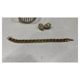 Womens bracelets and pair of earrings