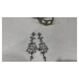 Womens pair of earrings and bracelets
