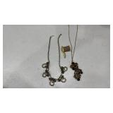 Womens necklaces and a flag pin