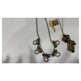 Womens necklaces and a flag pin