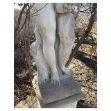 Concrete garden statue depicting the Roman god Bacchus on concrete base approximately 88 x 18 x 18 in VERY HEAVY will need help and equipment to remove. Easy alley to backyard access.