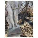 Concrete garden statue depicting the Roman god Bacchus on concrete base approximately 88 x 18 x 18 in VERY HEAVY will need help and equipment to remove. Easy alley to backyard access.
