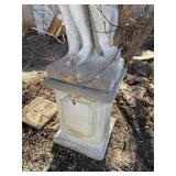 Concrete garden statue depicting the Roman god Bacchus on concrete base approximately 88 x 18 x 18 in VERY HEAVY will need help and equipment to remove. Easy alley to backyard access.
