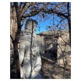 Concrete garden statue depicting the Roman god Bacchus on concrete base approximately 88 x 18 x 18 in VERY HEAVY will need help and equipment to remove. Easy alley to backyard access.