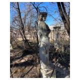 Concrete garden statue depicting the Roman god Bacchus on concrete base approximately 88 x 18 x 18 in VERY HEAVY will need help and equipment to remove. Easy alley to backyard access.